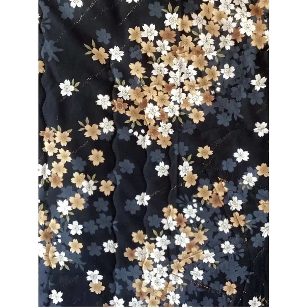 NWT. Gold and Black Star Lap Quilt